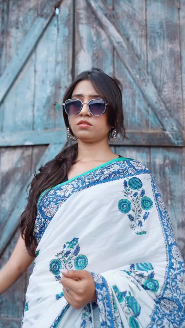 Elegant White Cotton Saree with Blue Floral Embroidery and Contrast Printed Border-Fronlioz