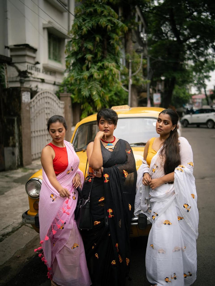 Playful Kolkata Motif Cotton Saree Collection – Pink, White & Black Handloom Sarees with Embroidered Taxi & Tram Designs-Fronlioz